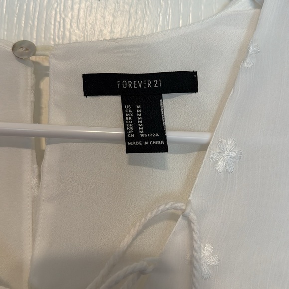 WHITE FLORAL ROMPER WITH BELL SLEEVES - Picture 7 of 14